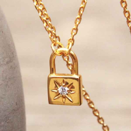 Collier fantaisie cadenas doré et pierre blanche brillante