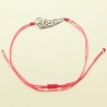 Bracelet fantaisie enfant corde fushia et aile argent