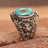 Chevalière têtes de lions et turquoise en argent massif ciselé