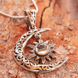 Collier Irma lune, soleil et topaze bleue