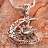 Collier Irma lune, soleil et topaze bleue